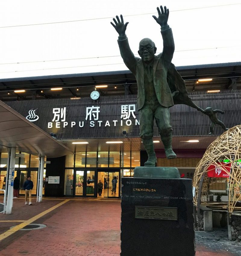 Beppu Station with Statue of Kumahachi Aburaya