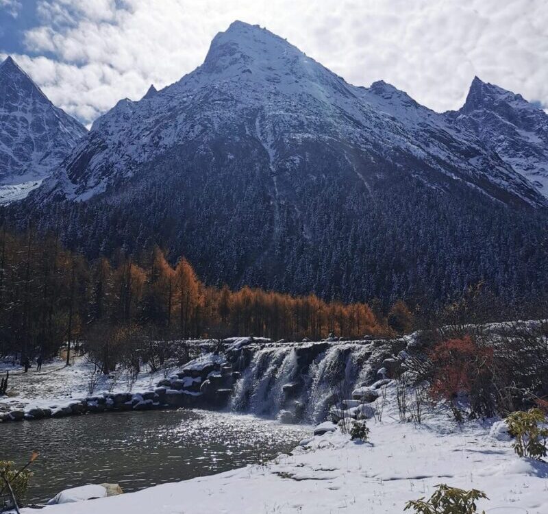 Bipenggou itinerary - Snow-capped mountain with waterfall