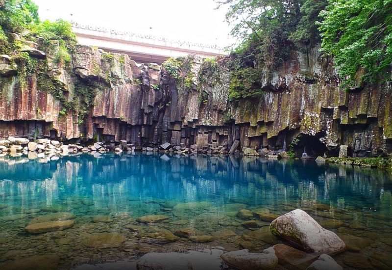 Cheonjiyeon Falls is a peaceful stop to see the gushing waterfall.