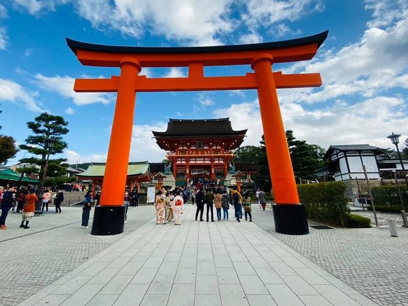 Giant vermilion torii gate at the Fushimi Inari Taisha entrance