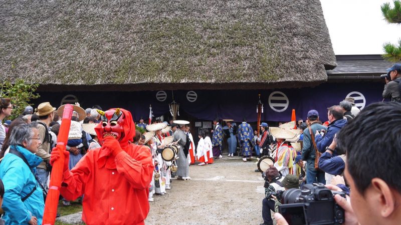 Man Wearing WIth Red-faced Devil Mask