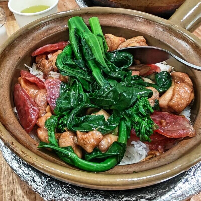 Min Ji Signature mushroom chicken claypot rice topped up with preserved meat