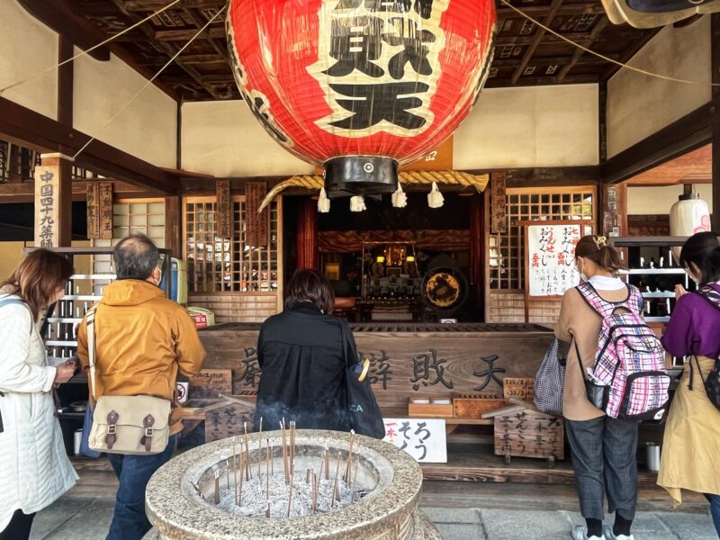 Praying at Daiganji Temple